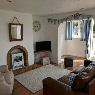 Living room with electric log fire